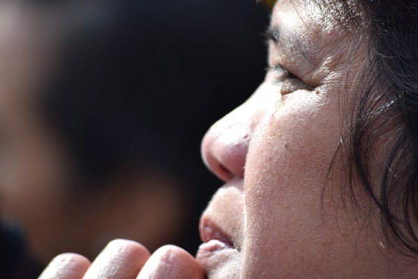 Asian lady hand at mouth DSC_0142