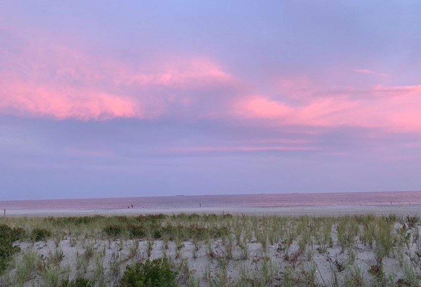 pink clouds purple sea