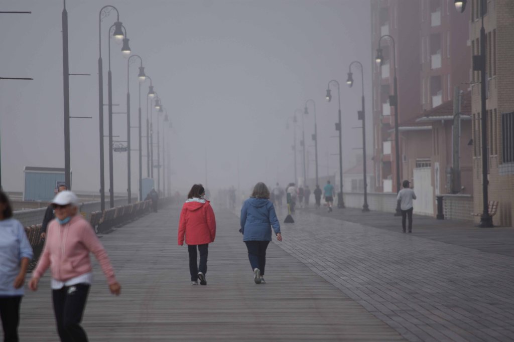 This image has an empty alt attribute; its file name is boarwalk-fog-trekkers-dsc_5745.jpg